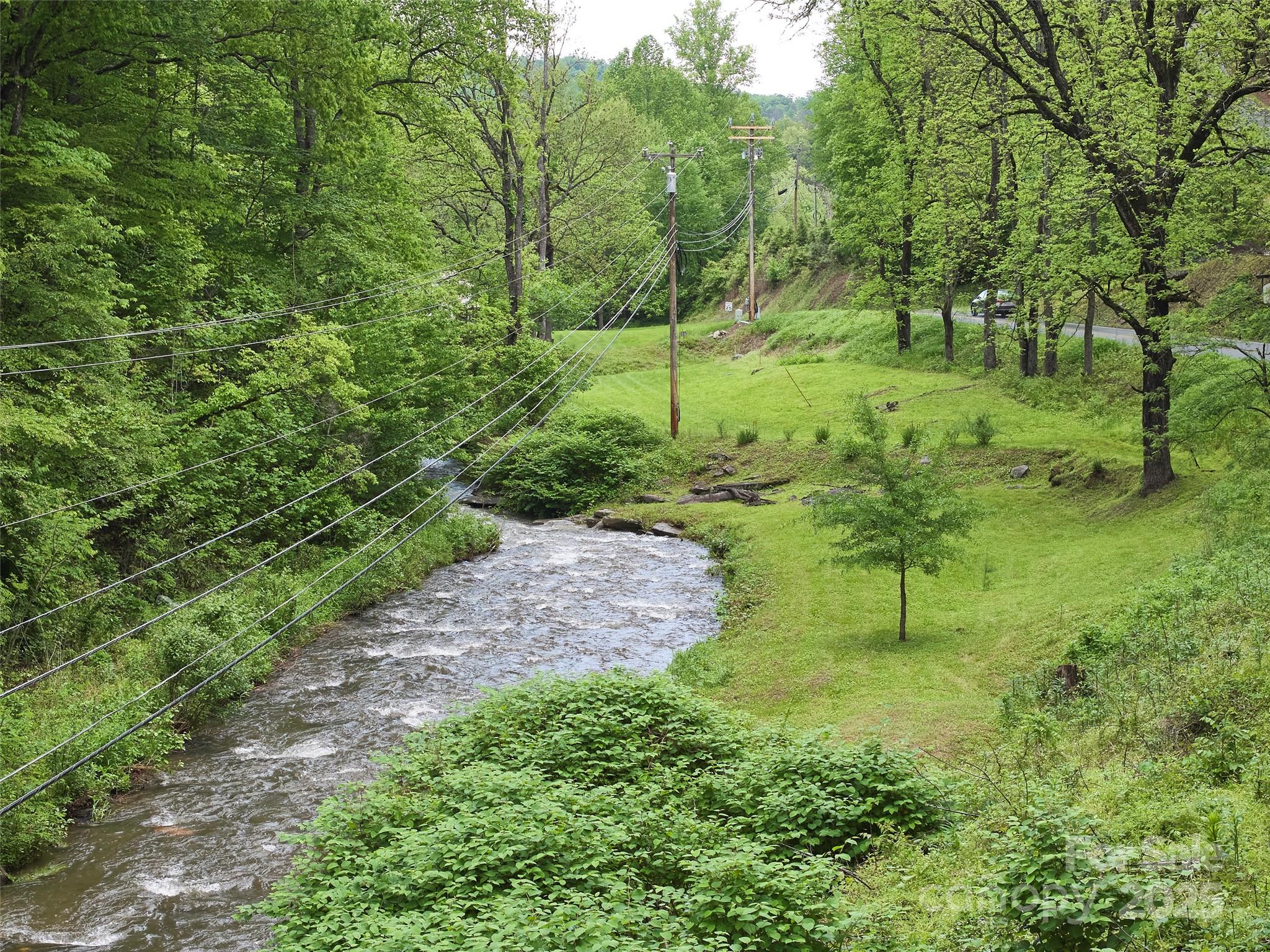 210 Conleys Creek Road Whittier, NC 28789 - Photo 25 of 31 a view of an outdoor space and a yard