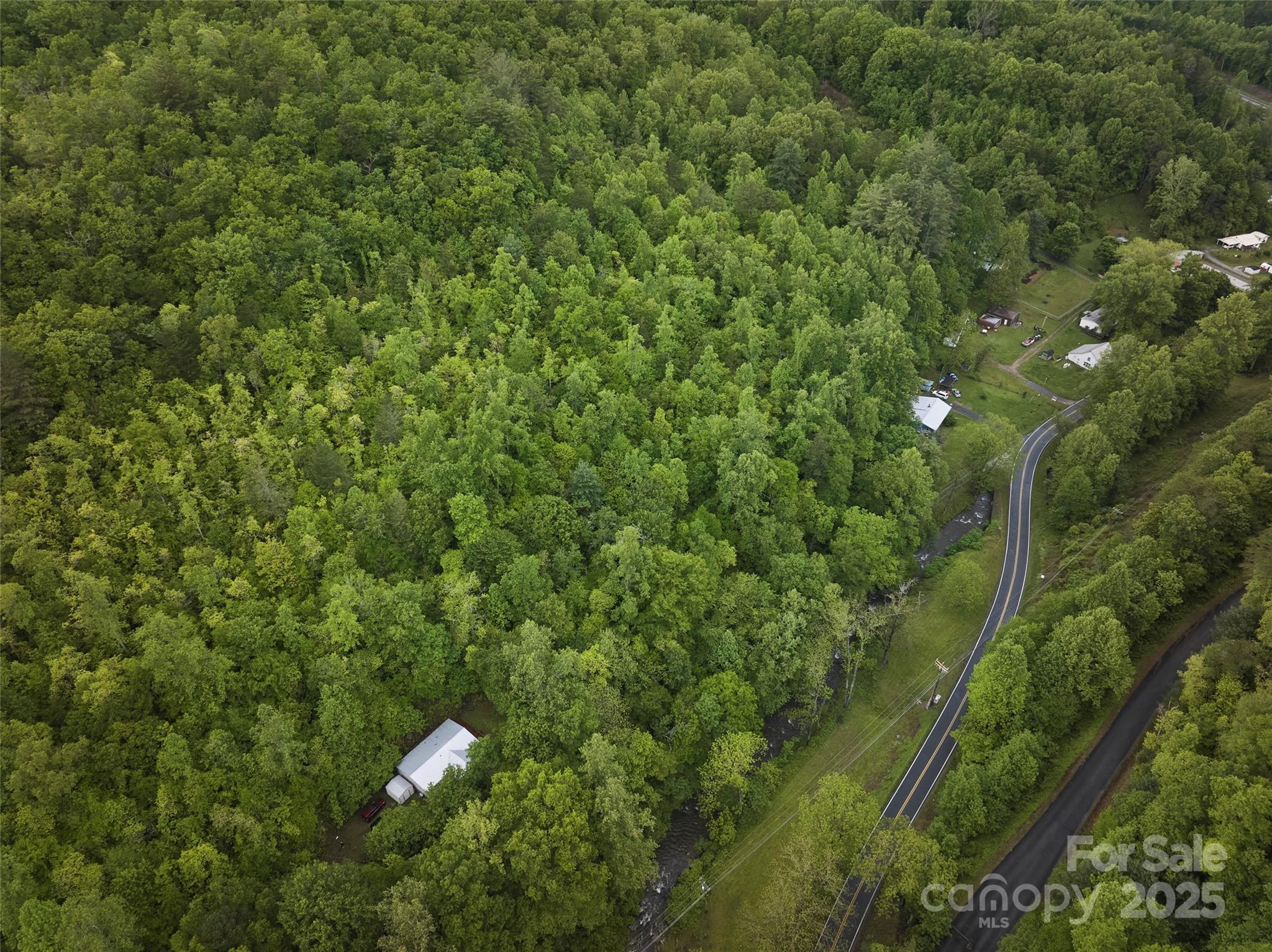 210 Conleys Creek Road Whittier, NC 28789 - Photo 30 of 31 a view of a house with a tree