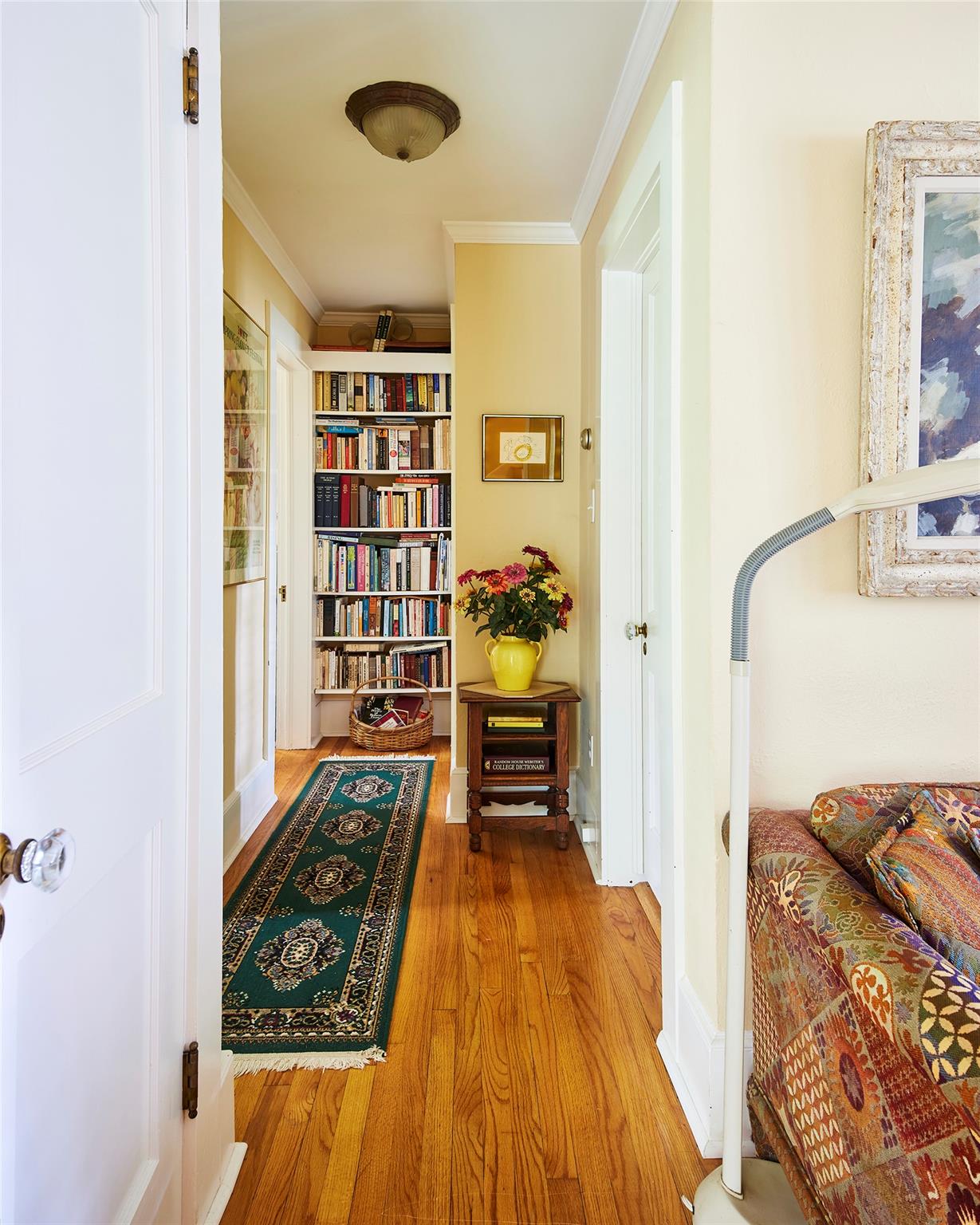 7 Harding Lane Roscoe, NY 12776 - Photo 16 of 26 a living room with a bed and a book shelf