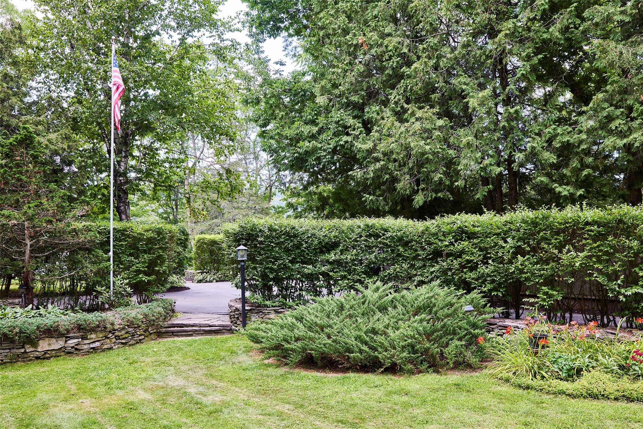7 Harding Lane Roscoe, NY 12776 - Photo 6 of 26 a view of a chair and table in the garden