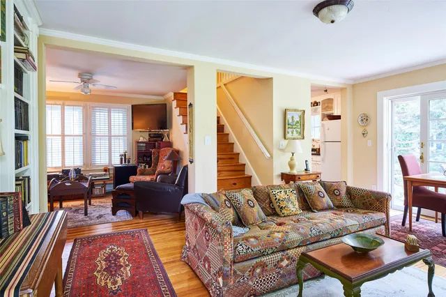 a living room with furniture and a rug