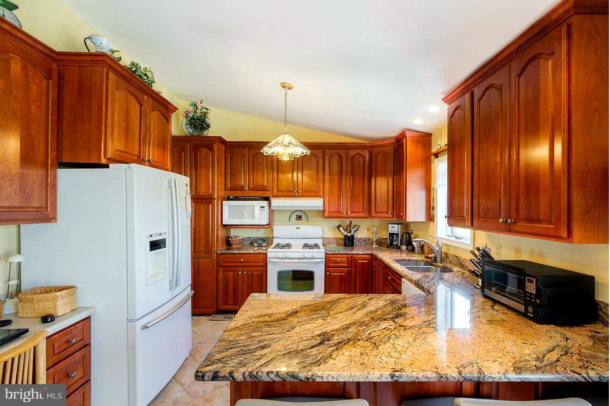 1931 Locust Road Pasadena, MD 21122 - Photo 10 of 30 Kitchen with Granite Counters