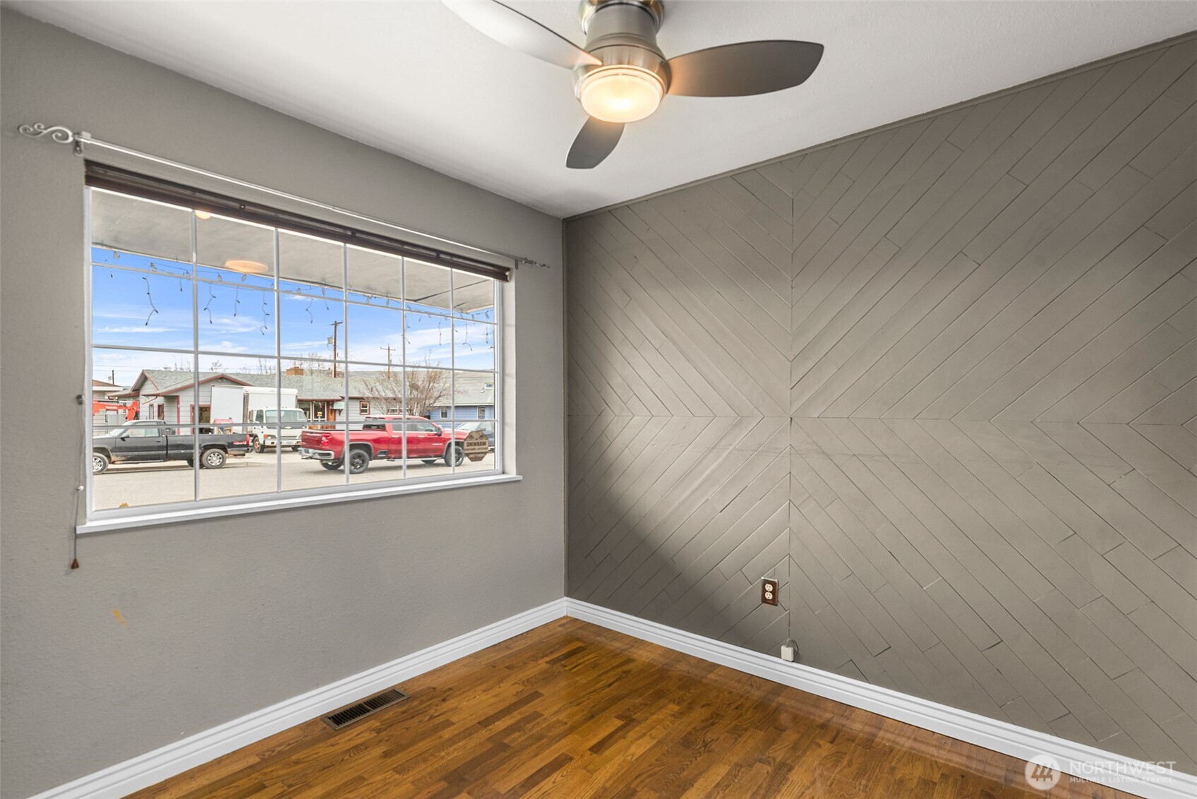 709 Schons Place Wenatchee, WA 98801 - Photo 8 of 28 a view of a kitchen with wooden floor and chandelier fan