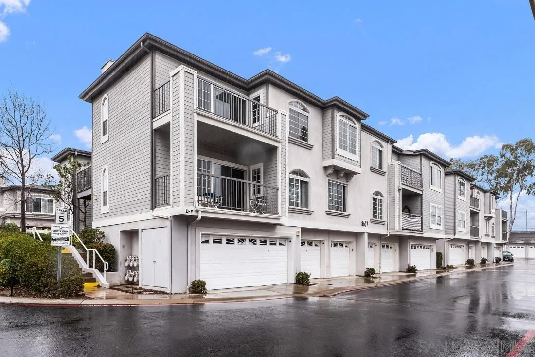 8637 Via Mallorca, Unit E La Jolla, CA 92037 - Photo 1 of 34 a front view of a building with street view