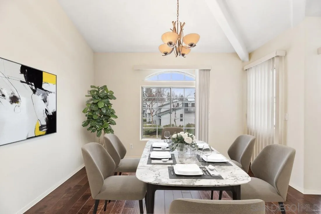 8637 Via Mallorca, Unit E La Jolla, CA 92037 - Photo 12 of 34 a view of a dining room with furniture window and outside view