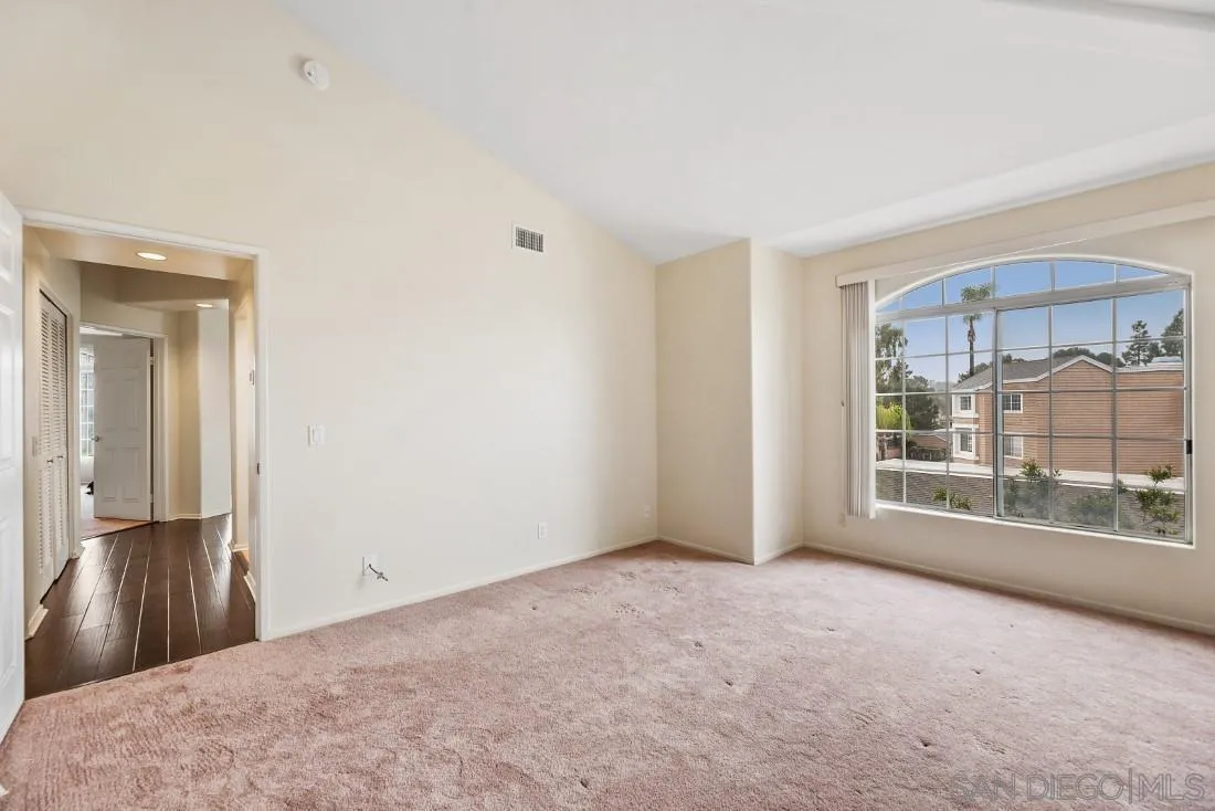 8637 Via Mallorca, Unit E La Jolla, CA 92037 - Photo 24 of 34 a view of an empty room with a window