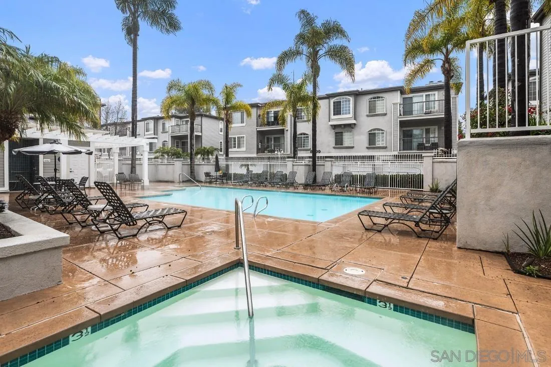 8637 Via Mallorca, Unit E La Jolla, CA 92037 - Photo 29 of 34 a view of a house with swimming pool