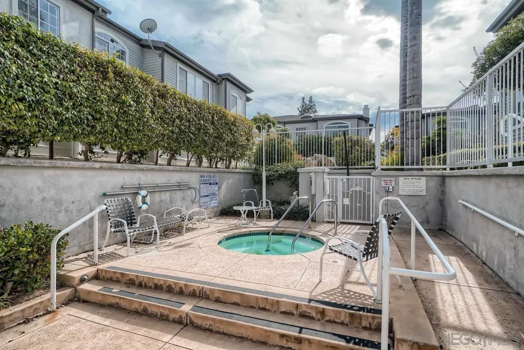 8637 Via Mallorca, Unit E La Jolla, CA 92037 - Photo 30 of 34 a view of a chair and table in patio