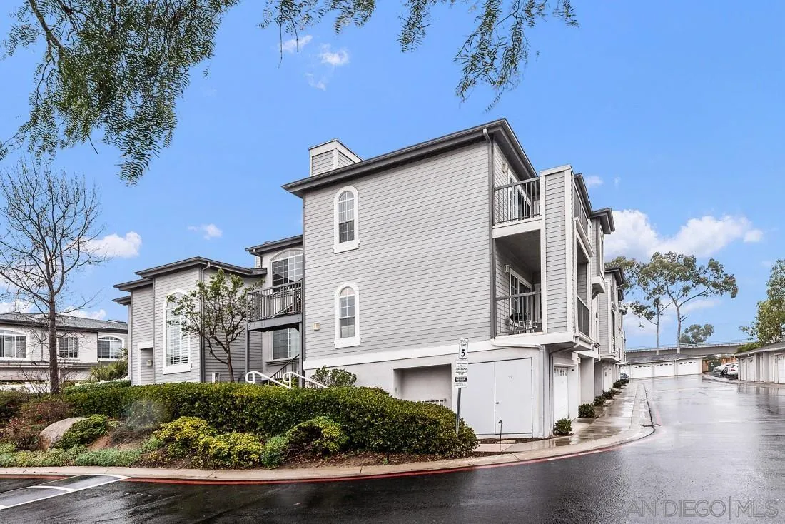 8637 Via Mallorca, Unit E La Jolla, CA 92037 - Photo 33 of 34 a front view of a house with garden