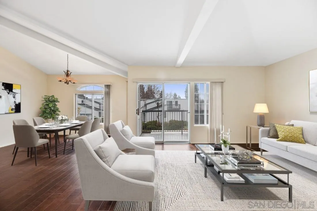 8637 Via Mallorca, Unit E La Jolla, CA 92037 - Photo 10 of 34 a living room with furniture and a large window