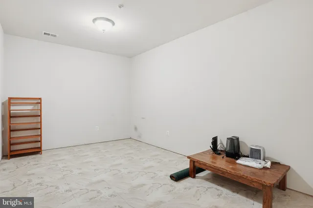 a room with furniture and natural light