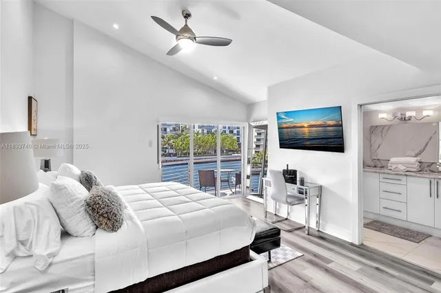 a bathroom with a shower and a glass door