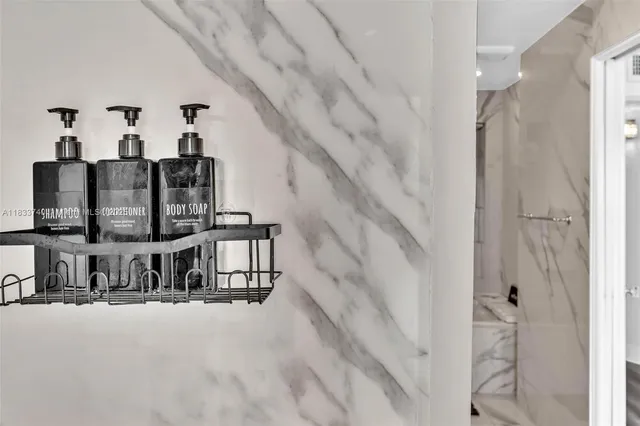 a living room with a couch and lamp