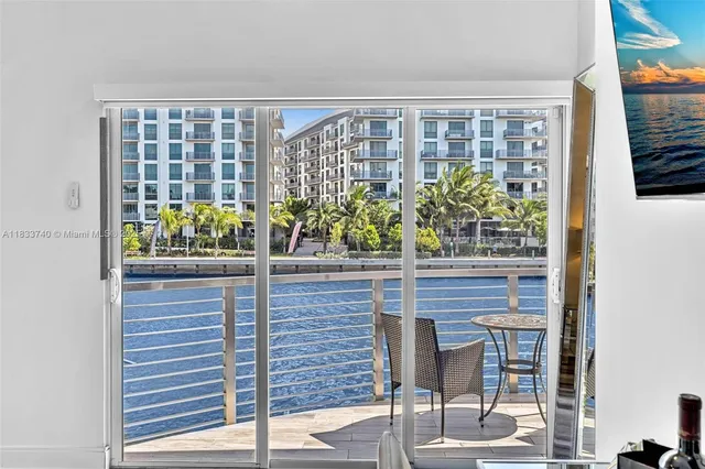 a view of a terrace with seating space and wooden floor