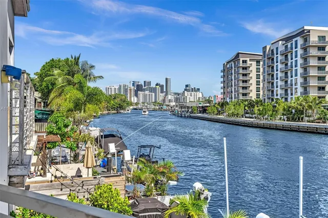 a view of a chairs and tables in patio