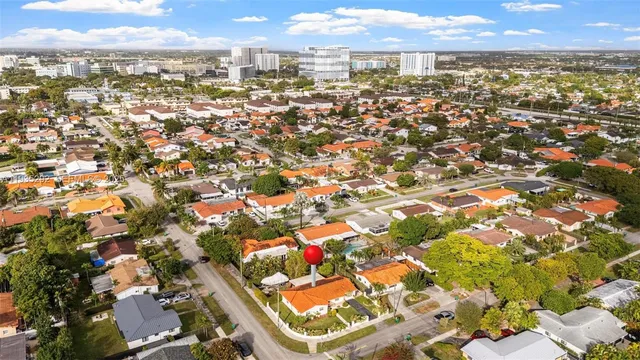 an aerial view of residential building with parking space