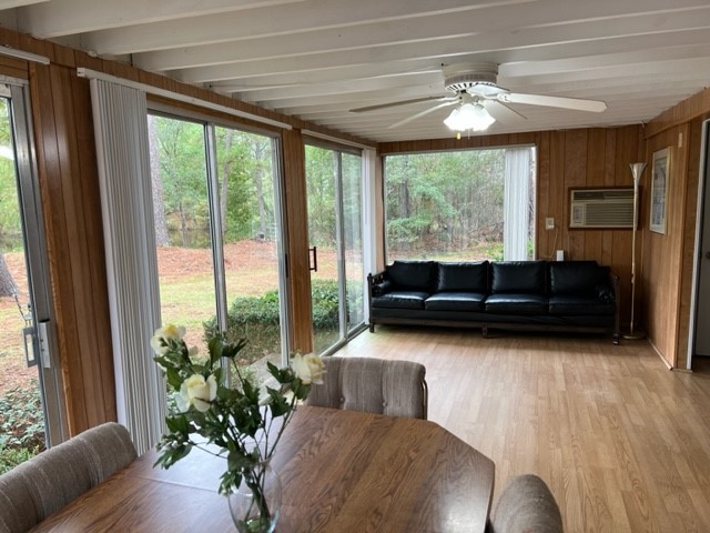 29 Thomas Lake Road Huntsville, TX 77320 - Photo 13 of 43 a living room with furniture and a large window