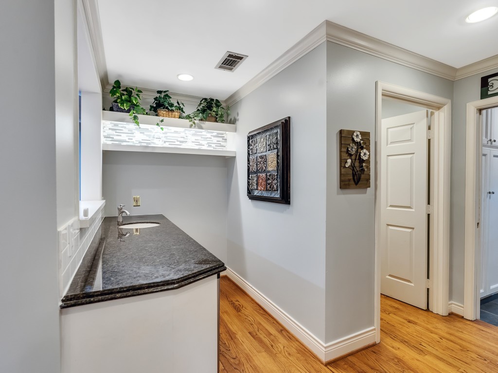 12307 Rip Van Winkle Drive Houston, TX 77024 - Photo 13 of 49 wet bar with ice maker and refrigerator
