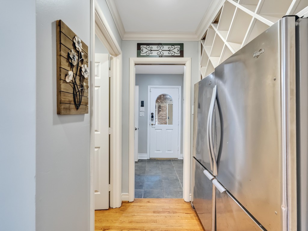 12307 Rip Van Winkle Drive Houston, TX 77024 - Photo 14 of 49 Hallway to back yard with two refrigerators