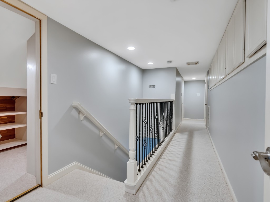 12307 Rip Van Winkle Drive Houston, TX 77024 - Photo 42 of 49 Stair and hallway on the second floor