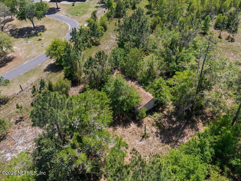5371 Church Road St. Augustine, FL 32092 - Photo 8 of 33 an aerial view of residential house with outdoor space and trees all around