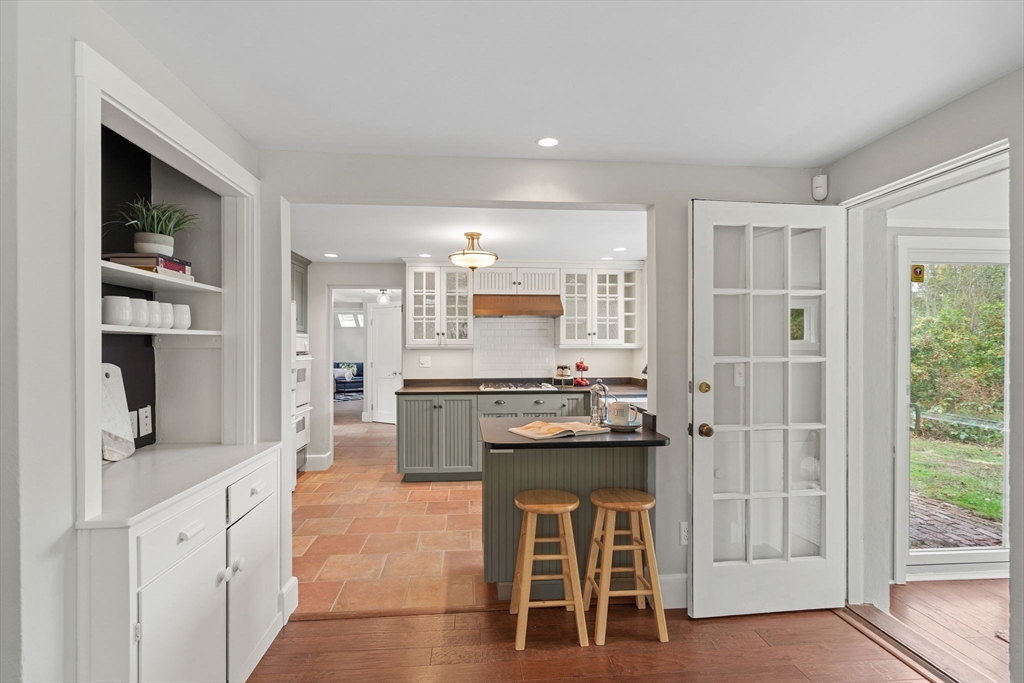 232 Sudbury Road Concord, MA 01742 - Photo 12 of 35 a kitchen with a stove and a refrigerator