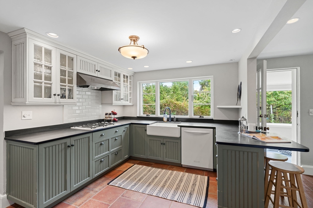 232 Sudbury Road Concord, MA 01742 - Photo 14 of 35 a kitchen with a sink stove and window