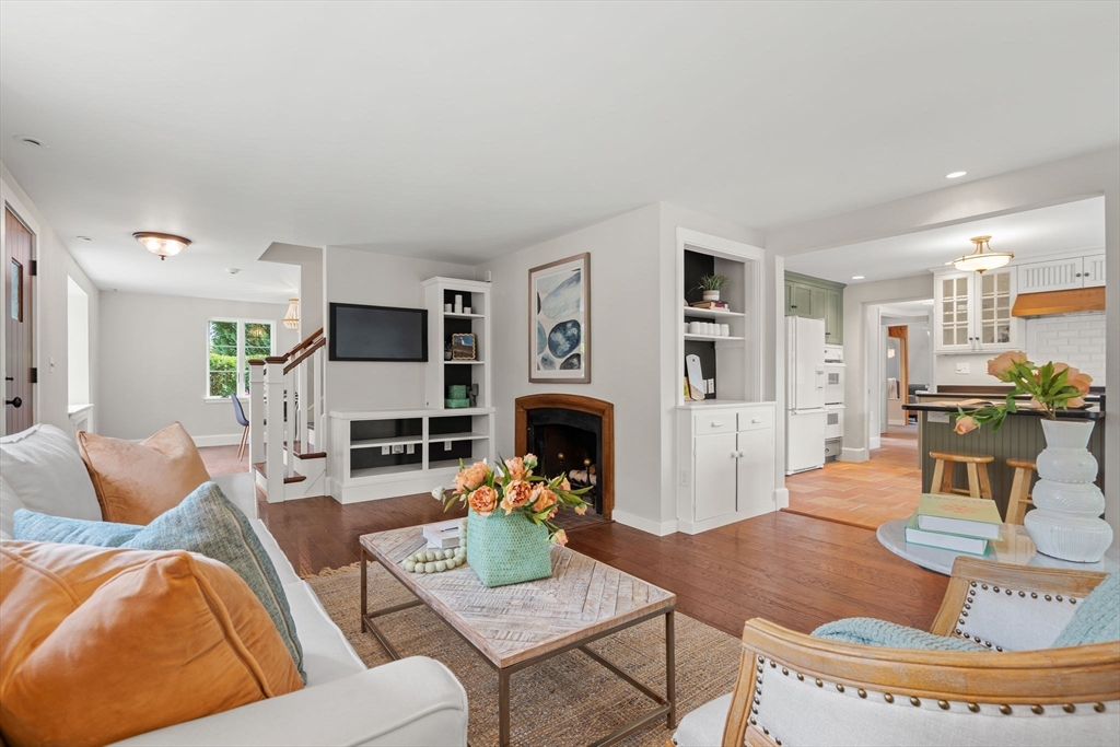 232 Sudbury Road Concord, MA 01742 - Photo 8 of 35 a living room with furniture and a fireplace