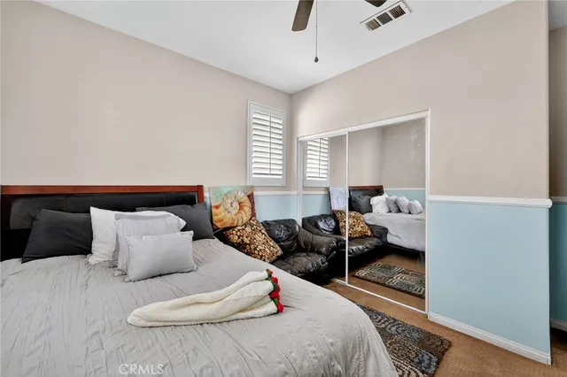 a bedroom with furniture and a couch