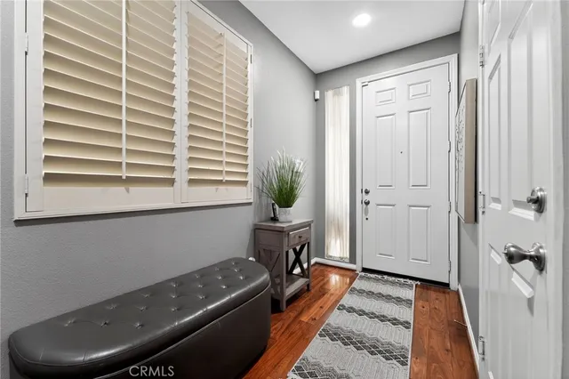 a room with a bed and a window