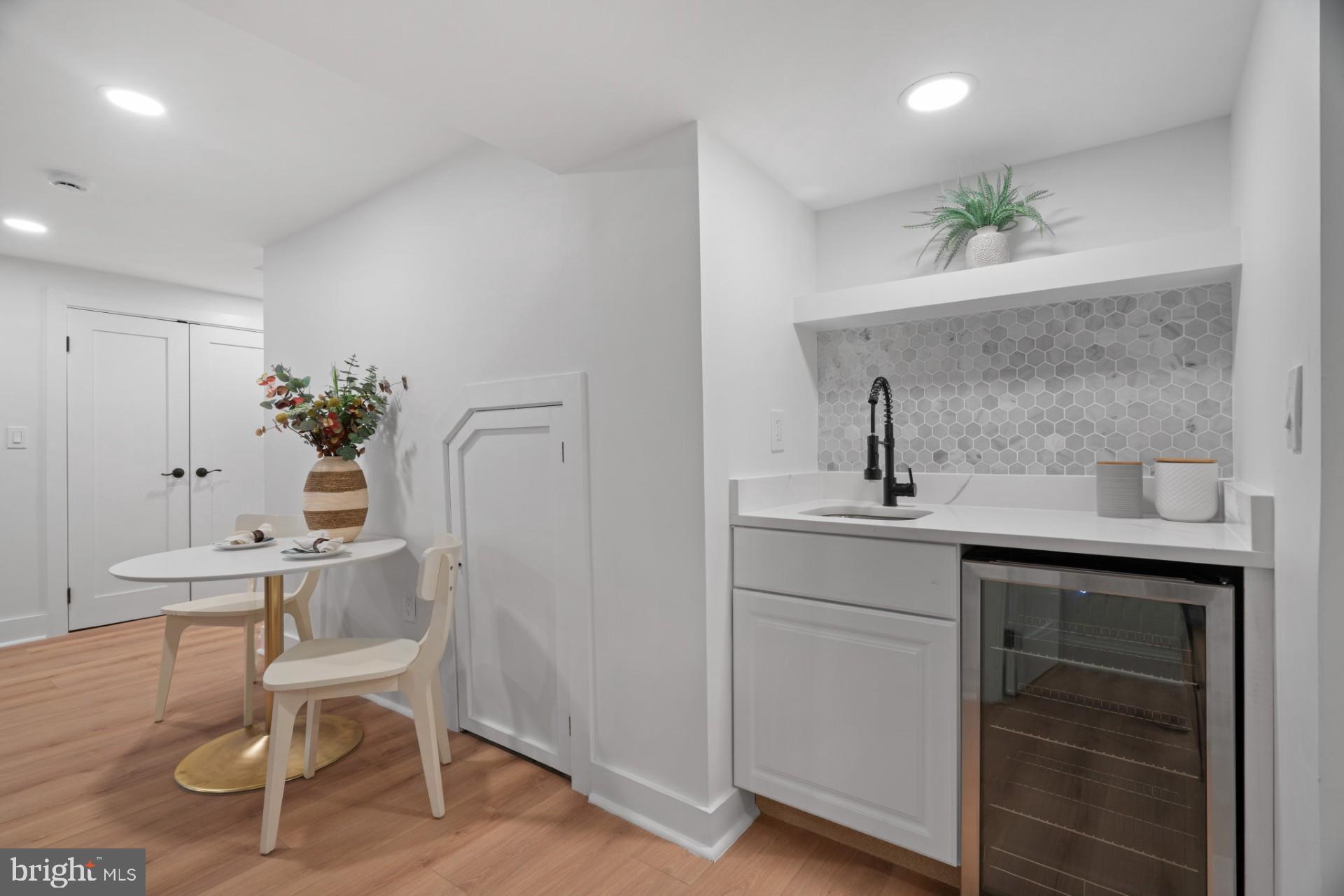 445 Decatur Street Northwest Washington, DC 20011 - Photo 19 of 28 a view of a workspace with furniture and wooden floor