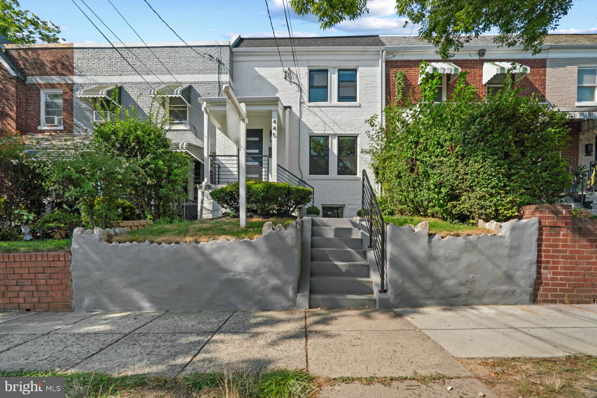 445 Decatur Street Northwest Washington, DC 20011 - Photo 2 of 28 front view of a house with a street