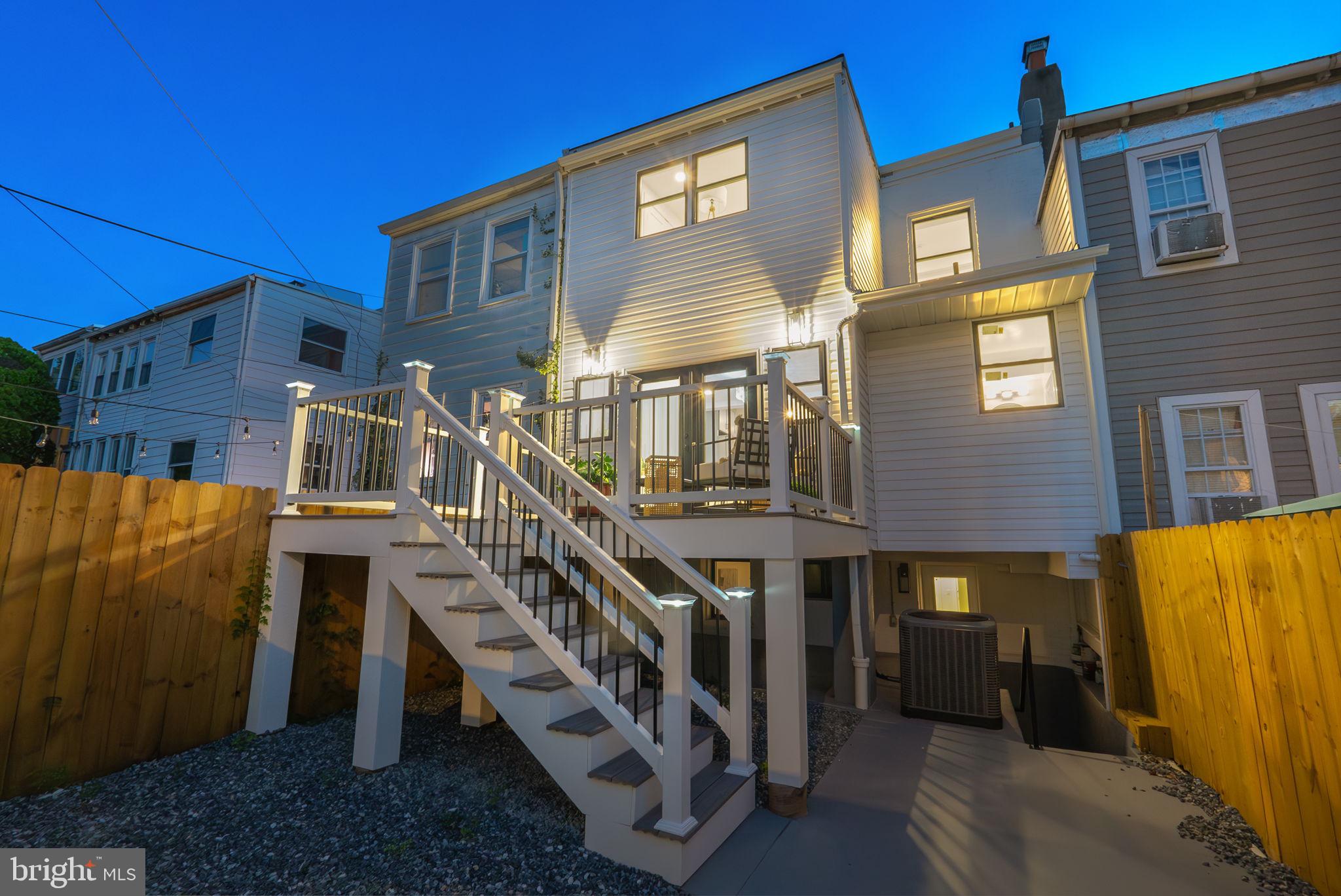 445 Decatur Street Northwest Washington, DC 20011 - Photo 24 of 28 a front view of a house with a yard