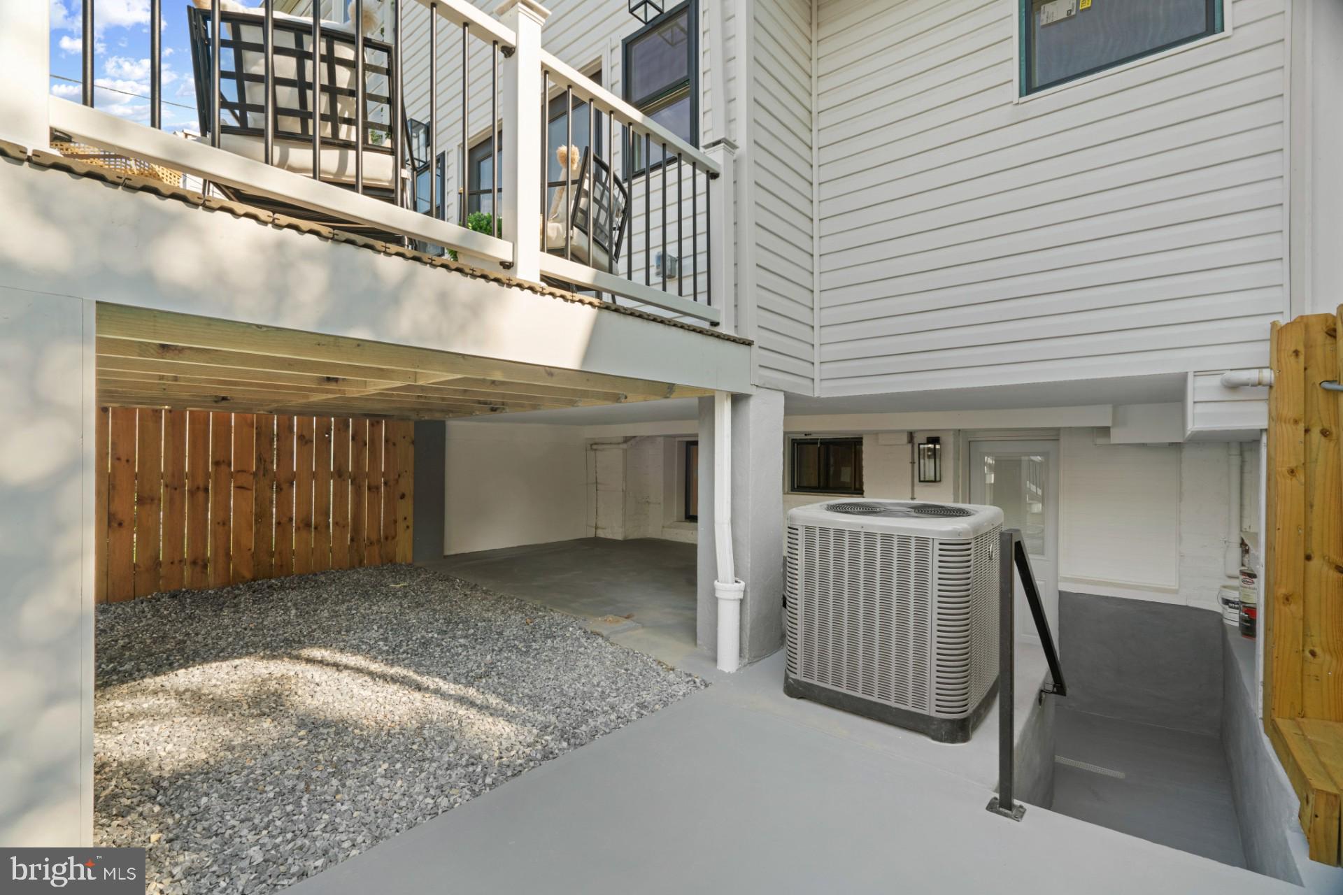 445 Decatur Street Northwest Washington, DC 20011 - Photo 25 of 28 a view of a house with a deck and furniture