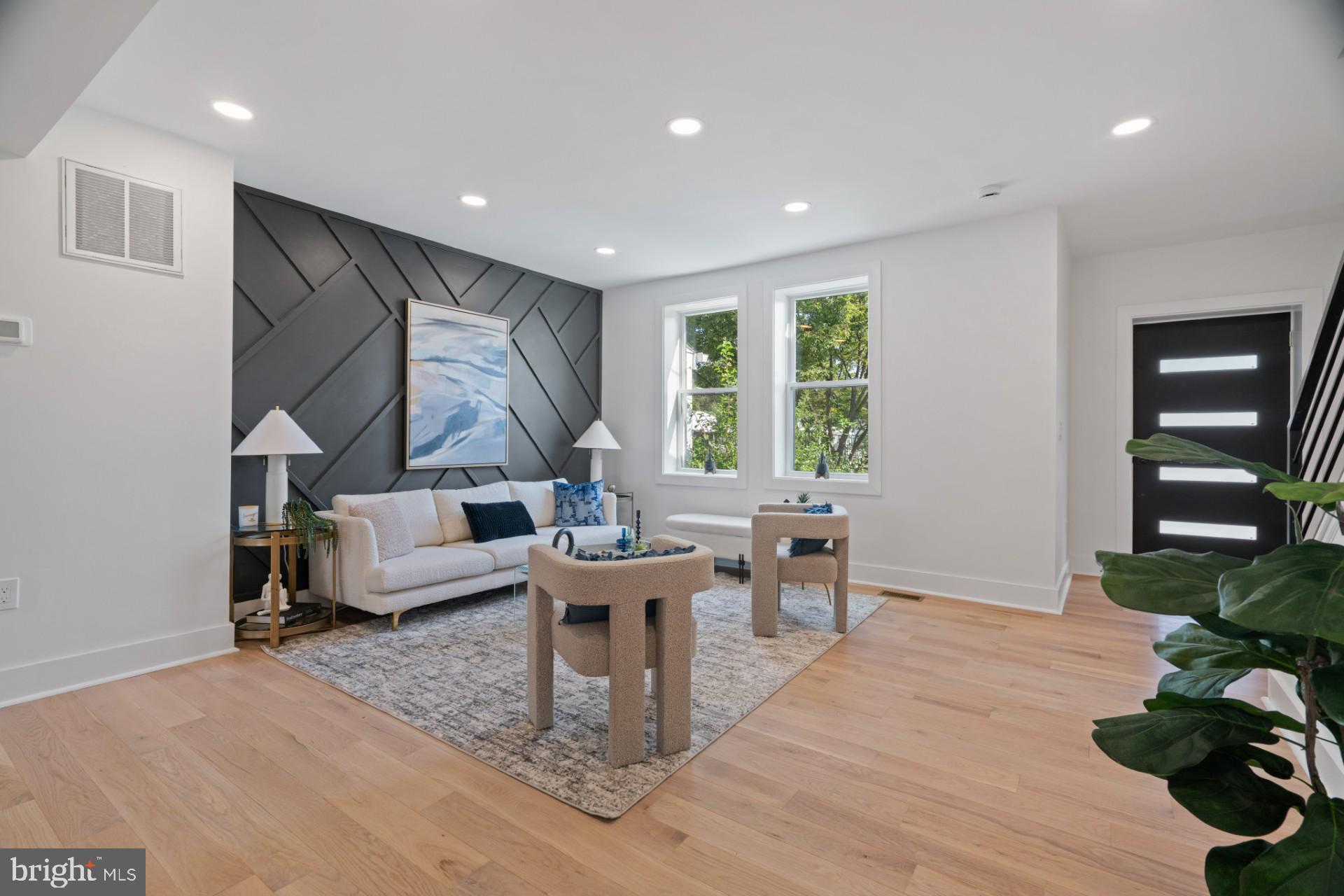 445 Decatur Street Northwest Washington, DC 20011 - Photo 6 of 28 a living room with furniture and a large window