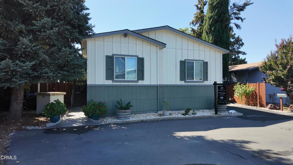 3900 North State Street, Unit 56 Ukiah, CA 95482 - Photo 1 of 29 a front view of a house with a yard