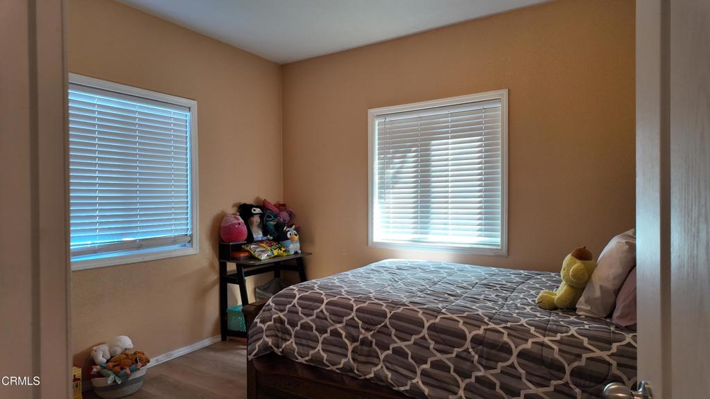3900 North State Street, Unit 56 Ukiah, CA 95482 - Photo 12 of 29 a bedroom with a bed and a window