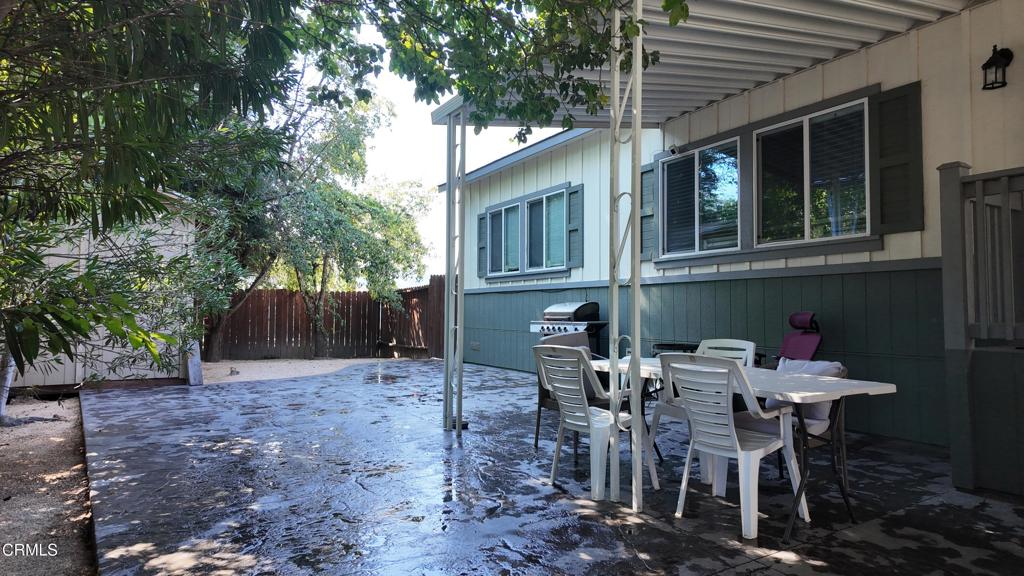 3900 North State Street, Unit 56 Ukiah, CA 95482 - Photo 20 of 29 a view of a patio with table and chairs and potted plants