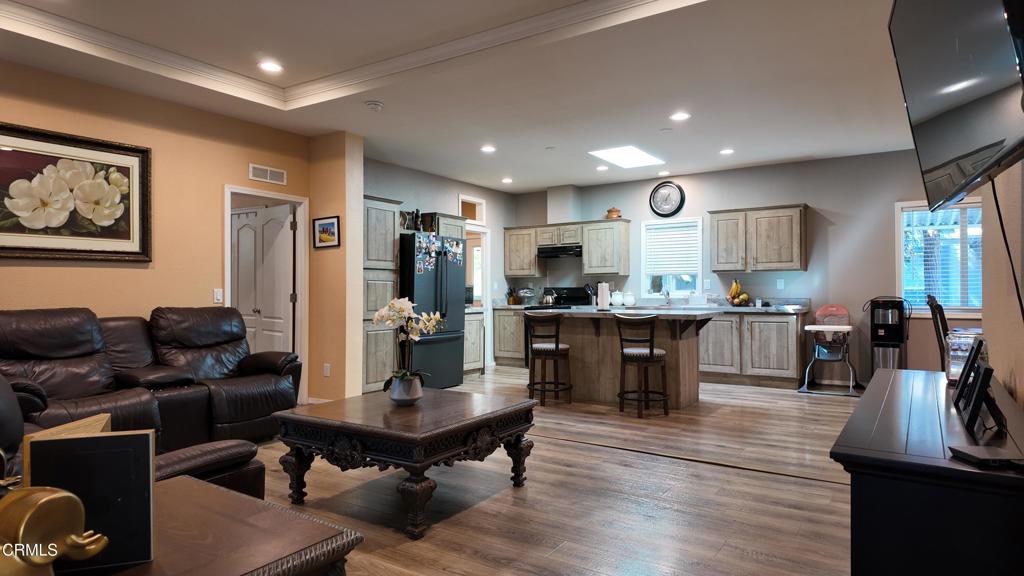 3900 North State Street, Unit 56 Ukiah, CA 95482 - Photo 2 of 29 a living room with stainless steel appliances kitchen island granite countertop furniture and a view of kitchen