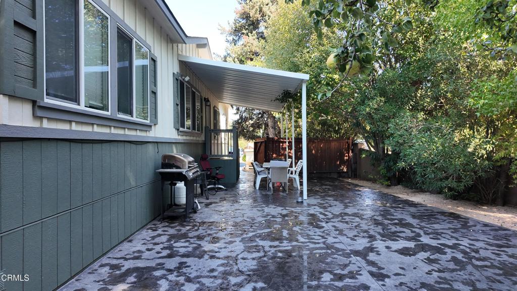 3900 North State Street, Unit 56 Ukiah, CA 95482 - Photo 21 of 29 a view of a chairs and table in backyard