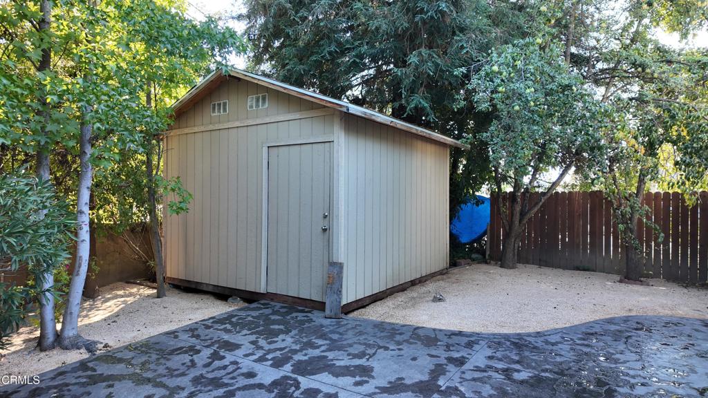 3900 North State Street, Unit 56 Ukiah, CA 95482 - Photo 23 of 29 a view of a wooden house with a small yard
