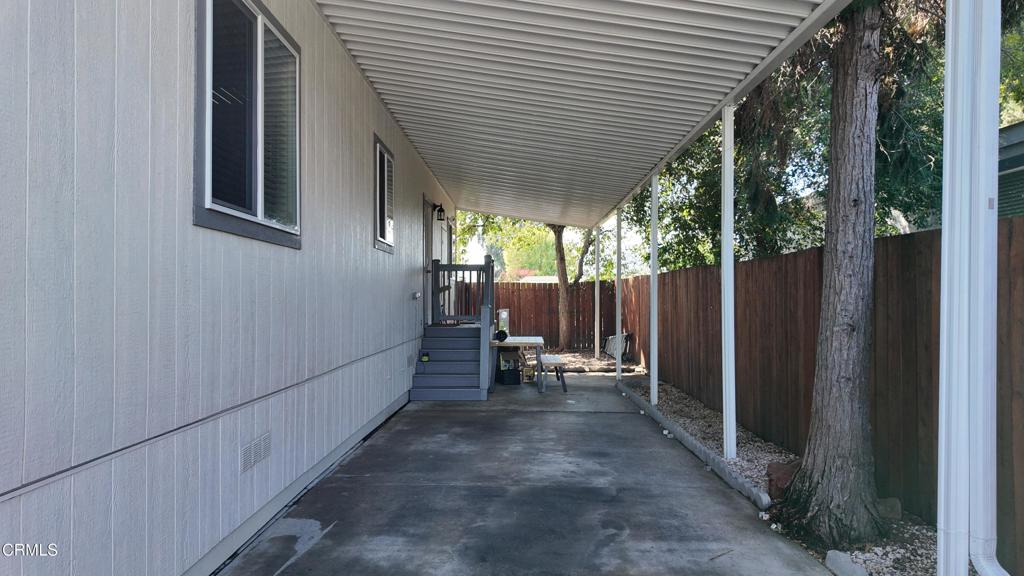 3900 North State Street, Unit 56 Ukiah, CA 95482 - Photo 25 of 29 a view of a house with backyard and sitting area