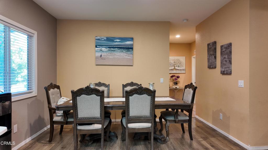 3900 North State Street, Unit 56 Ukiah, CA 95482 - Photo 8 of 29 a view of a dining room with furniture and wooden floor
