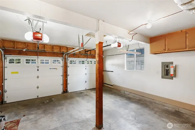 a view of a kitchen with storage and utility room
