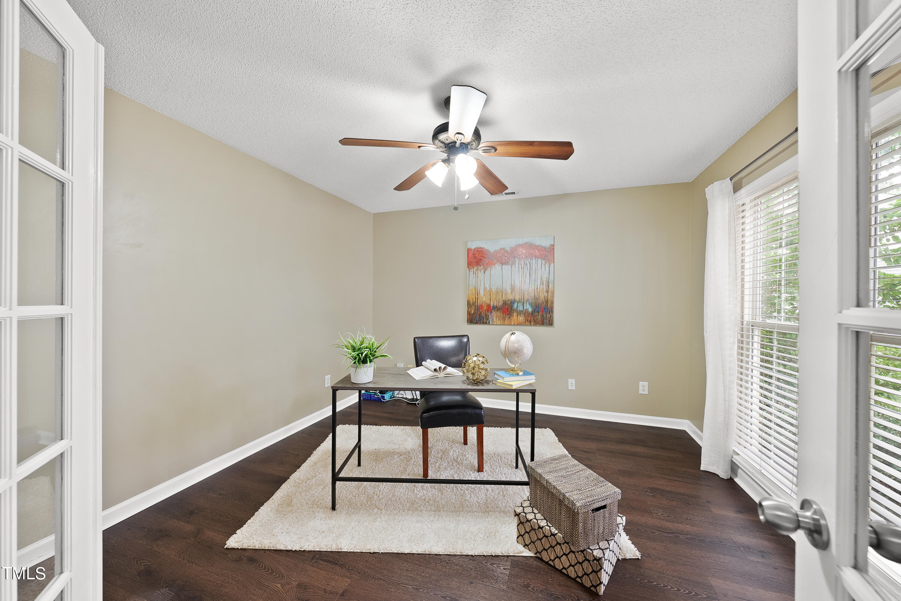 6801 Edwell Court Raleigh, NC 27617 - Photo 3 of 37 a workspace room with furniture and wooden floor