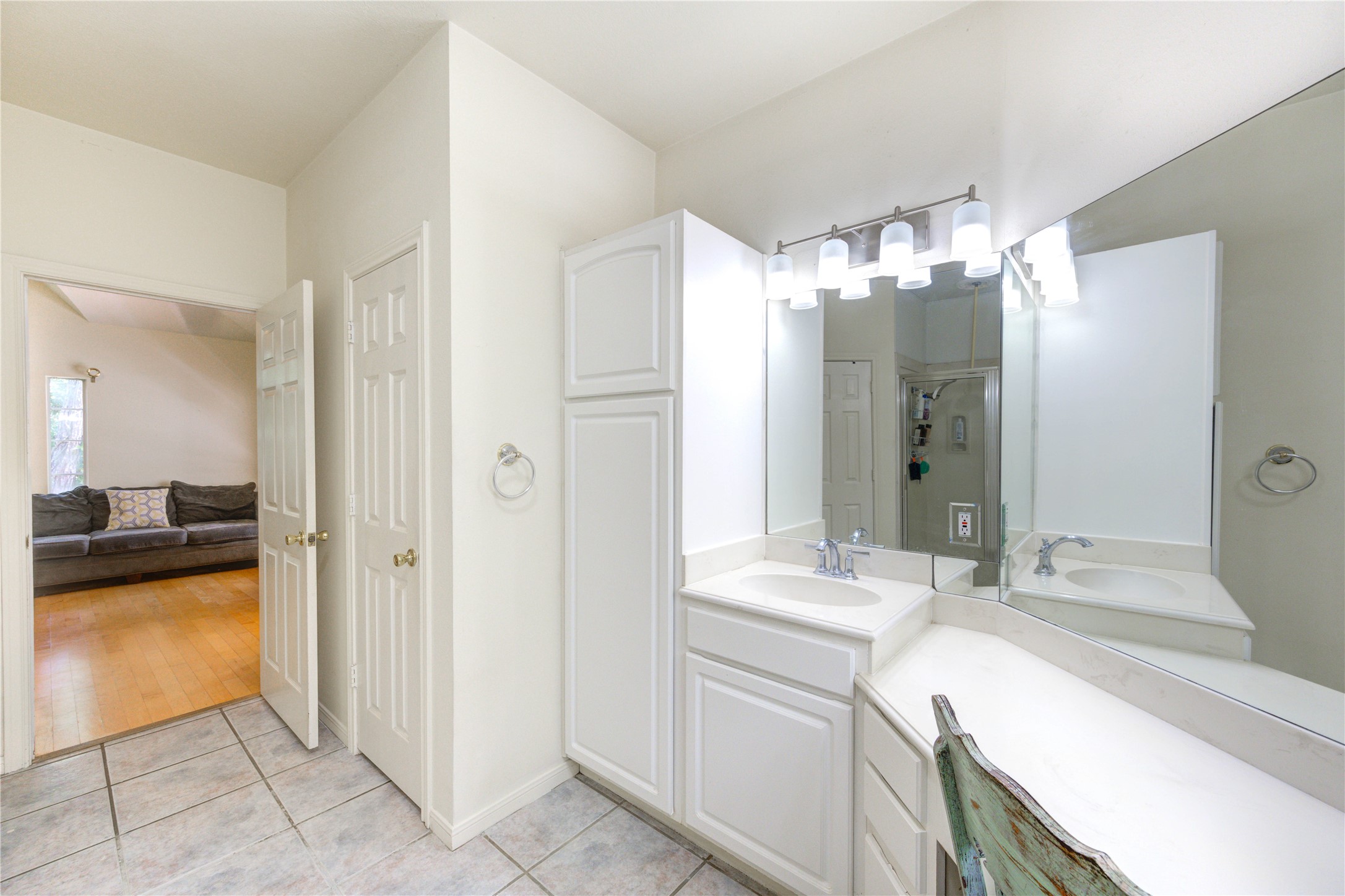 25903 Penguin Street Magnolia, TX 77355 - Photo 20 of 46 a bathroom with a sink and a mirror