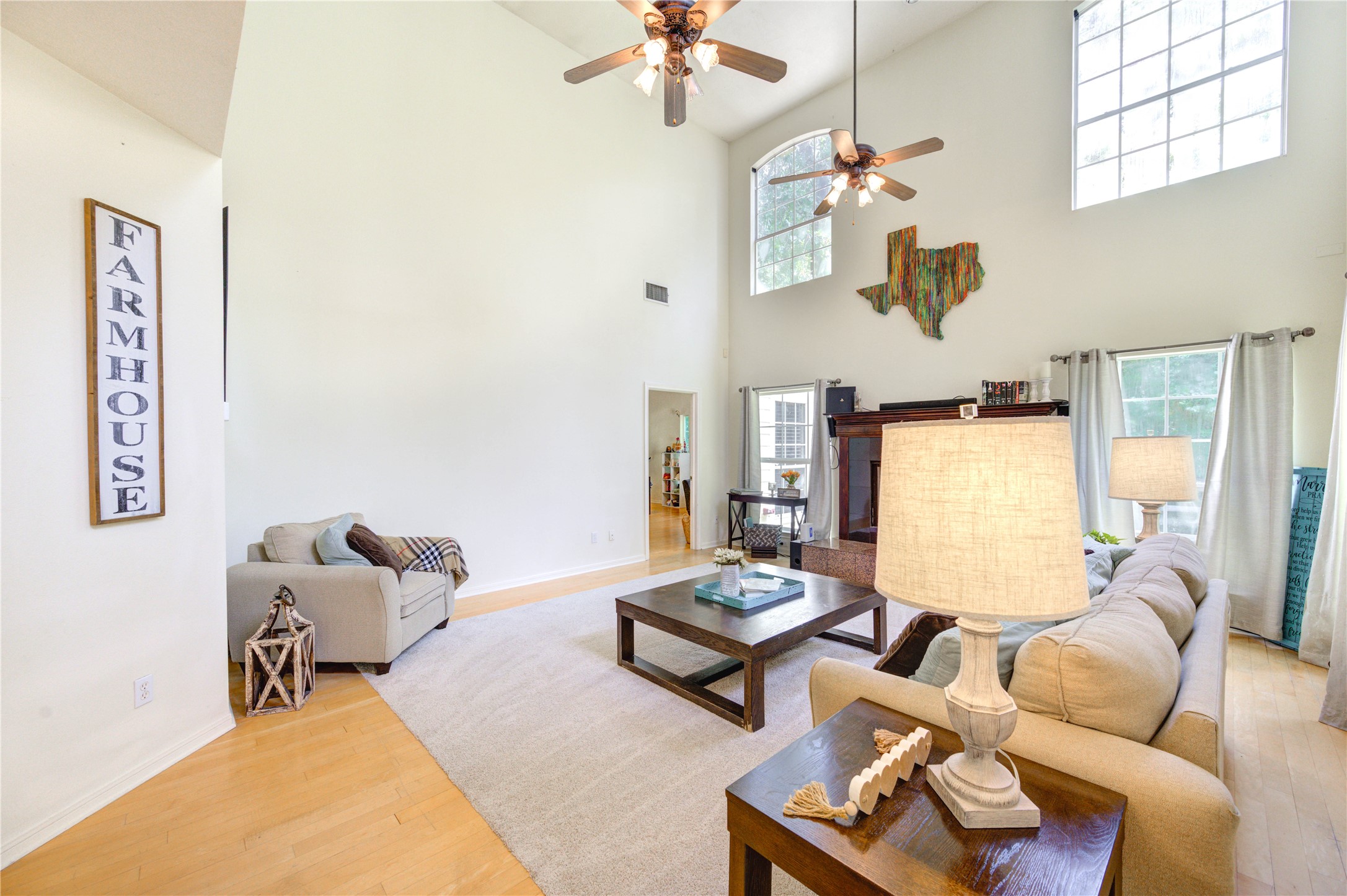 25903 Penguin Street Magnolia, TX 77355 - Photo 27 of 46 a living room with furniture and floor to ceiling window