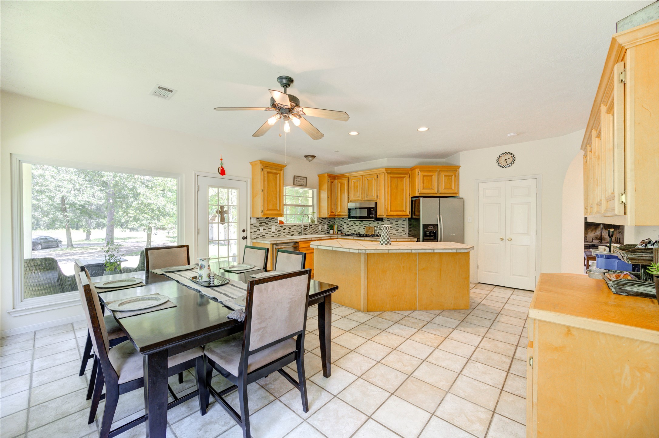 25903 Penguin Street Magnolia, TX 77355 - Photo 37 of 46 a view of a dining room with furniture window and outside view