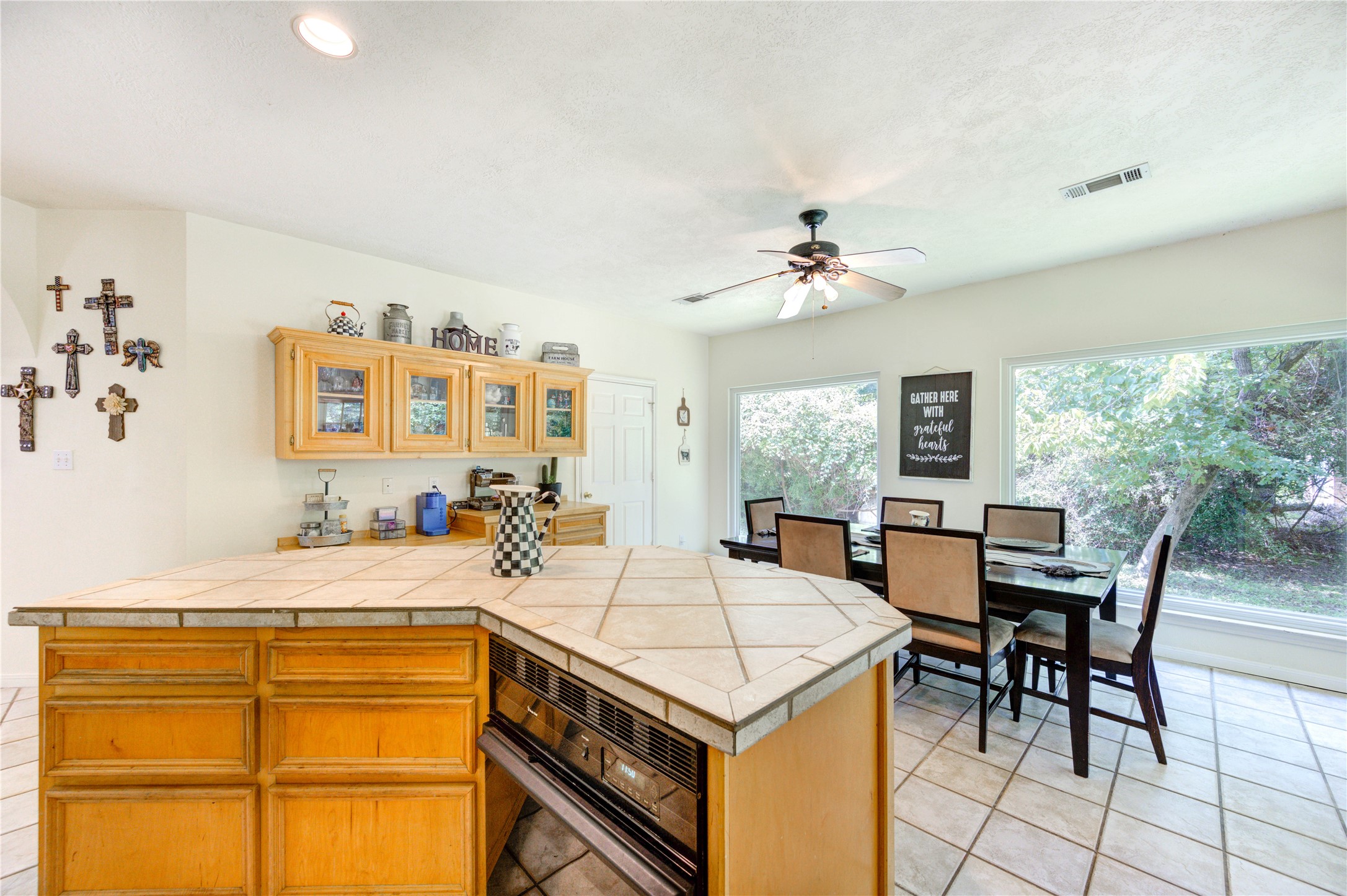 25903 Penguin Street Magnolia, TX 77355 - Photo 41 of 46 a view of a dining room with furniture and a chandelier