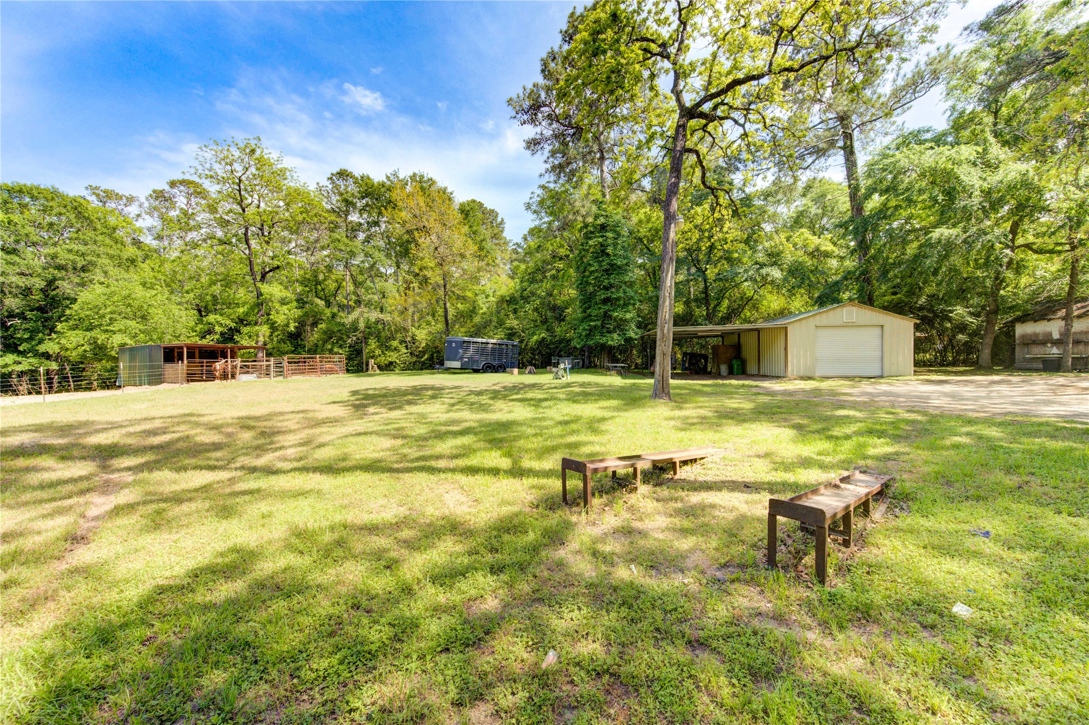 25903 Penguin Street Magnolia, TX 77355 - Photo 7 of 46 a swimming pool with outdoor seating and yard